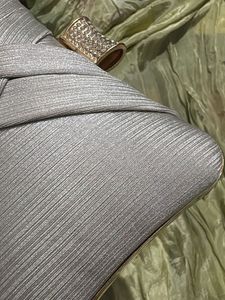 Elegant Silver Clutch Bag with Rhinestone Clasp