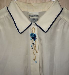 Elegant Cream Blouse with Blue Embroidery
