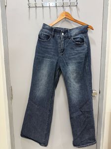 dark wash blue jeans