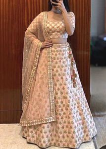 peach light pink lehenga with heavy embroidery