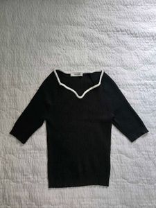 Stylish Black Ribbed Top with White Trim
