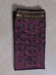 Elegant Purple Saree with Intricate Patterns
