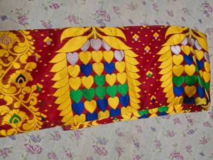 Vibrant Red Saree with Floral Motifs