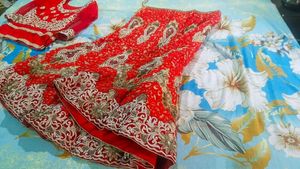 beautiful bright red fish cut heavy bridal lehanga