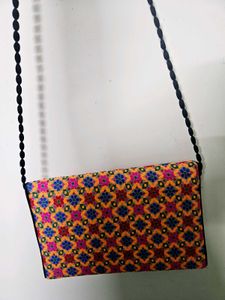 Vibrant Embroidered Clutch Bag