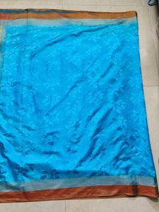 Elegant Teal Saree with Leaf Motif