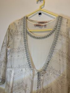 Elegant White Ethnic Gown with Silver Embellishmen