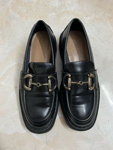 Classic Black Loafers with Gold Buckle