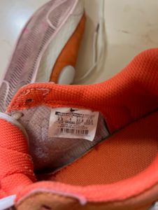 Nike Orange Suede Sneakers
