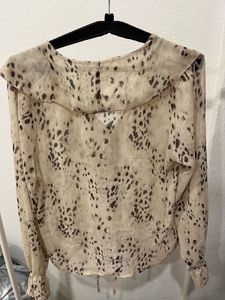 Chic Ruffle Blouse with Animal Print