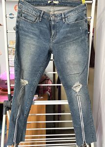 Torn Zipper Jeans