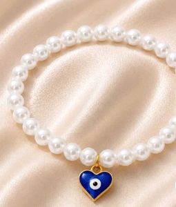Pearl Bracelet with Heart Charm