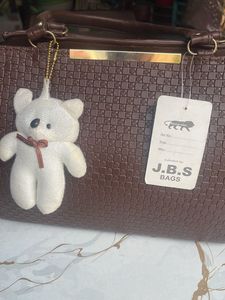 Stylish Brown Handbag with Bear Charm