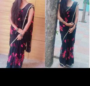 Elegant Black Saree with Pink Floral Print