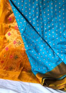 Stunning Teal Saree with Gold Accents