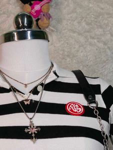 Women's black and white striped polo tee