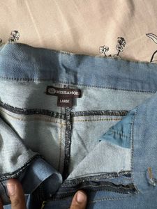 Distressed Blue Denim Jeans