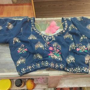 Rama lehenga with multi  emrodary