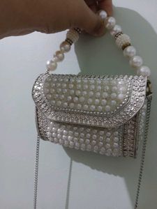 Elegant Pearl Embellished Clutch from Snatcher
