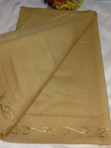 Elegant Beige Saree with Green Floral Embroidery