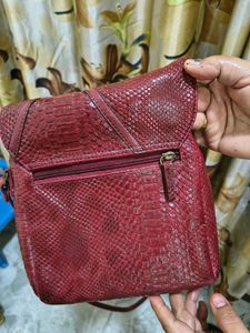 Stylish Baggit Brand maroon colour Crossbody Bag