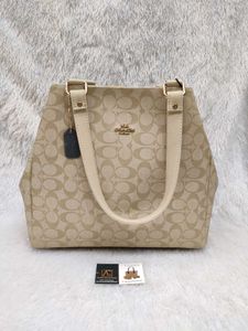 Coach Signature Pattern Handbag