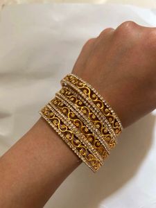 Elegant Gold Tone Bangle Set