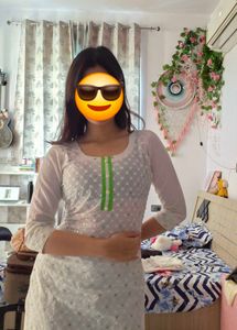 Elegant White Kurta with Green Accents