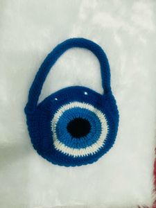 handmade crochet evil eye bag