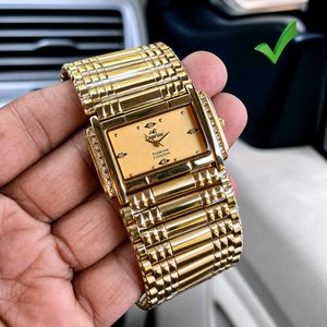 Elegant Gold Watch with Diamond Accents