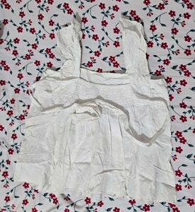 White Ruffled Sleeveless Top