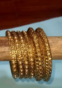 Elegant Gold Bangles with Pearl Embellishments