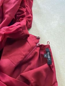Elegant Red Jumpsuit with Embellishments