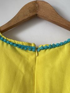Vibrant Yellow jumpsuit with Teal Trim