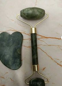 gua sha , jade roller and a head massager