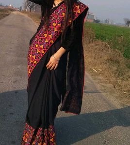 Elegant Black Saree with Embroidered Border