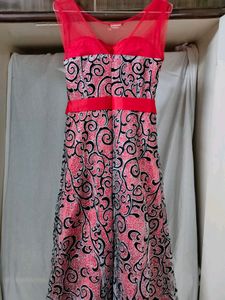 Glittery Red Gown With Black Detailing