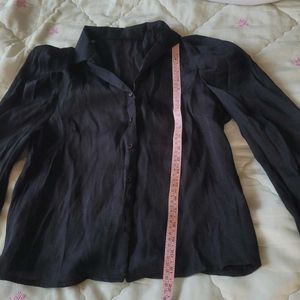 Black long sleeve shirt perfect for casual as well