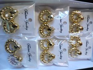 anti tarnish Chic Gold-Tone Twisted Hoop Earrings