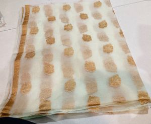 Elegant White & Gold Embellished Saree