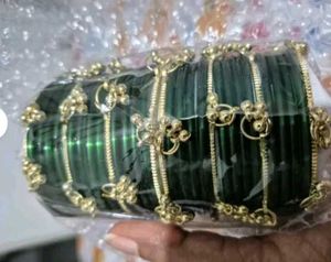 Elegant Green Bangles with Gold Accents