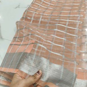 peach colour organza saree with designer blouse