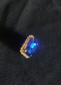 Classic Sapphire Earrings With Diamonds Around It