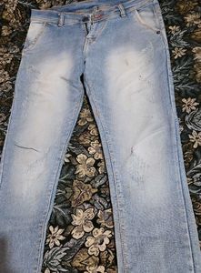 Light Wash Distressed Denim Jeans