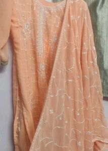 orange kurta set with beads work