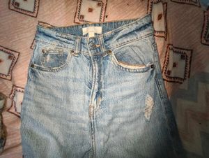 Distressed Light Wash Denim Jeans