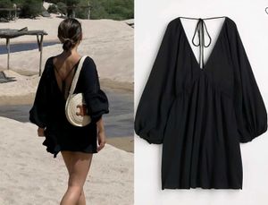 Black Flowy Mini Dress with Open Back