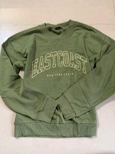olive green sweatshirt