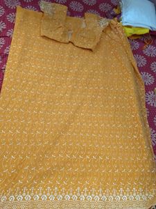 orange chikankari saree