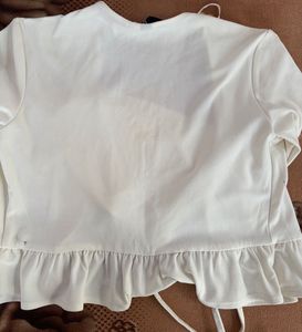 Cream Ruffle Tie-Front Top